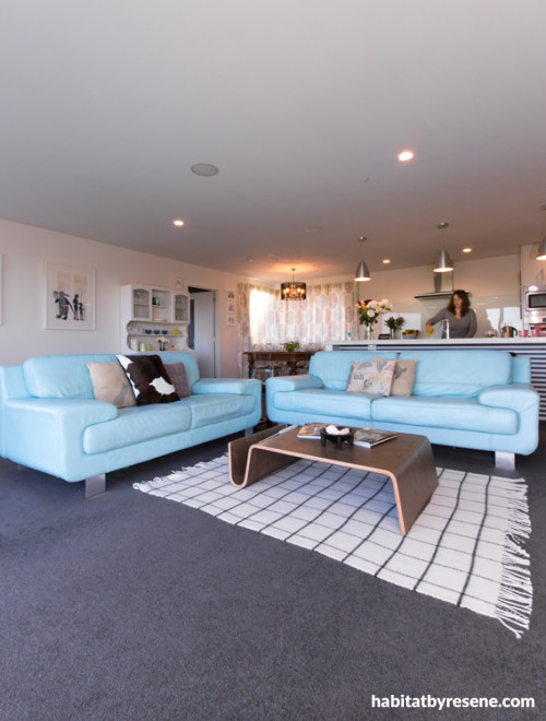 living room, lounge, open-plan, white paint, grey carpet, blue leather sofa