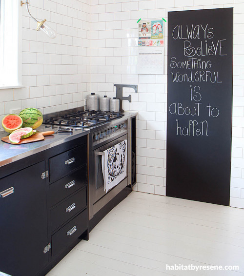 black and white kitchen, black cabinets, white kitchen tiles, blackboard paint, kitchen makeover