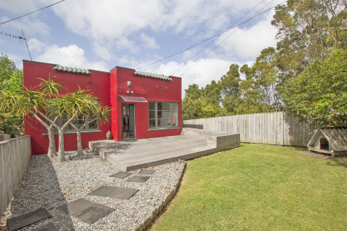 house exterior, red exterior, painted exterior, red paint, art deco home