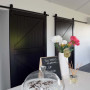 kitchen, black and white kitchen, monochromatic, modern barn doors, black doors