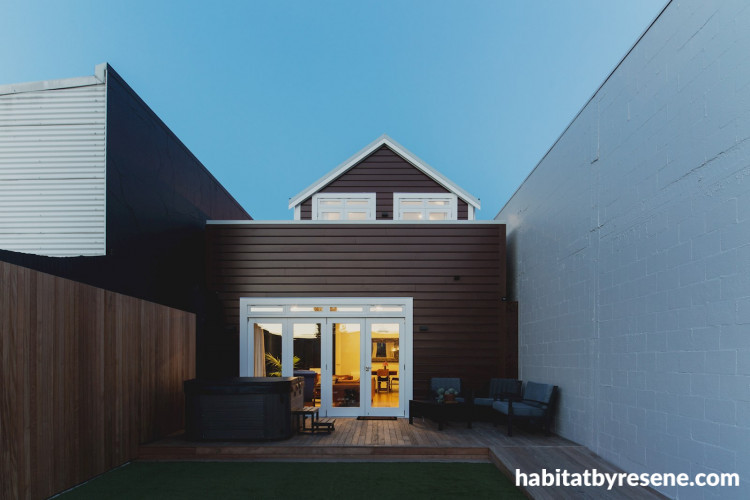 house exteiror, brown house, brown exterior, courtyard, deck, outdoor living