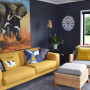 modern French country, black living room, navy lounge, yellow couch, elephant art