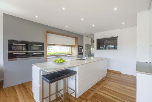 white kitchen, grey kitchen, grey feature wall, neutral kitchen, marble benchtop, grey and white