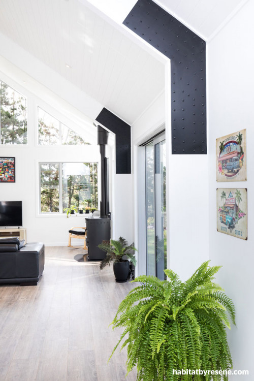black and white living room, lounge, exposed steel, fireplace, monochrome lounge