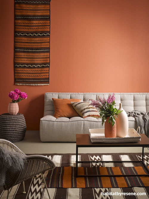 living room, lounge, earthy tones, terracotta feature wall, terracotta lounge, African inspired