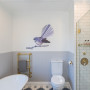 blue bathroom, kids bathroom, tongue and groove, resene, fantail decal, bath tub, brass tapware