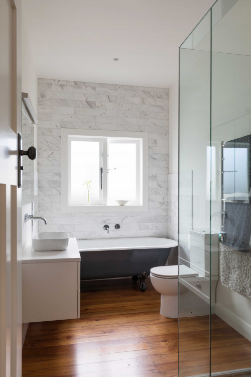 bathroom, white bathroom, neutral bathroom, renovated bungalow, clawfoot bath, bathroom feature wall
