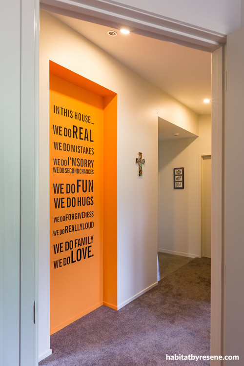 entranceway, hallway, orange paint, writing on walls, interior design, white paint