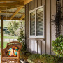 house exterior, board and batten cladding, brown painted exterior, lifestyle block home