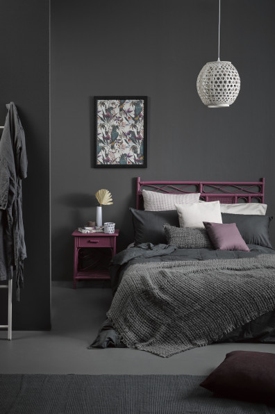 A sophisticated slate bedroom gets a tropical twist A sophisticated slate bedroom gets a tropical twist