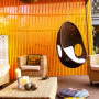 pavilion, orange paint, hanging char, feature wall, timber, contemporary garden, modern exterior