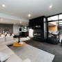 lounge, black and white lounge, grey lounge, black feature wall, open plan living, resene nero