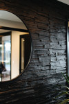 This striking black kitchen is the crown jewel of a contemporary North Otago farmstead