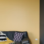 tv room, lounge, yellow lounge, black and yellow. yellow feature wall, yellow tv room
