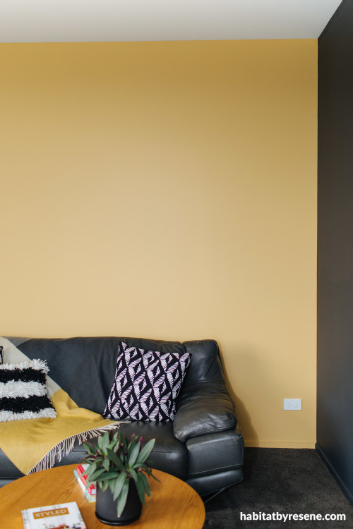 tv room, lounge, yellow lounge, black and yellow. yellow feature wall, yellow tv room