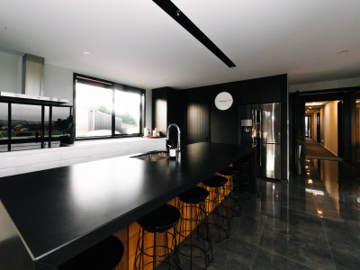 This striking black kitchen is the crown jewel of a contemporary North Otago farmstead This striking black kitchen is the crown jewel of a contemporary North Otago farmstead