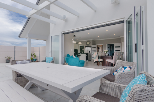 interior, exterior, deck, indoor outdoor flow, white paint, dining room