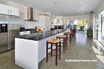 beach house, kitchen, white kitchen, open plan living, concrete floors