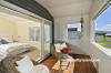 beach house, deck, bedroom, bedroom deck, white bedroom, black and white, covered deck 