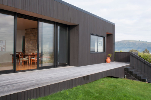 house exterior, black house, brown house, stain, cedar cladding, stone feature wall
