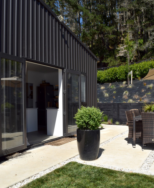 house exterior, black exterior, black house, shed turned home, resene ironsand