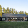 house exterior, barn style house, black house, black exterior, outdoor living area