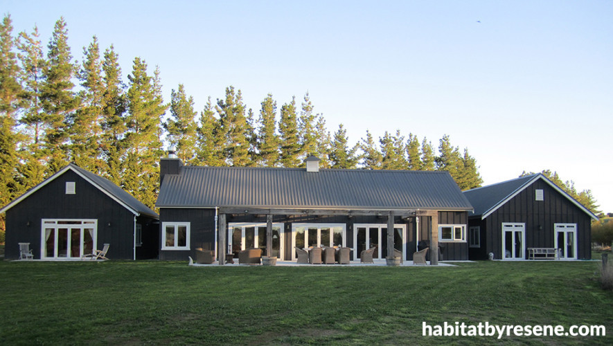 house exterior, barn style house, black house, black exterior, outdoor living area