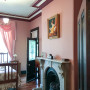 bedroom, red bedroom, fireplace, rose paint, pink bedroom