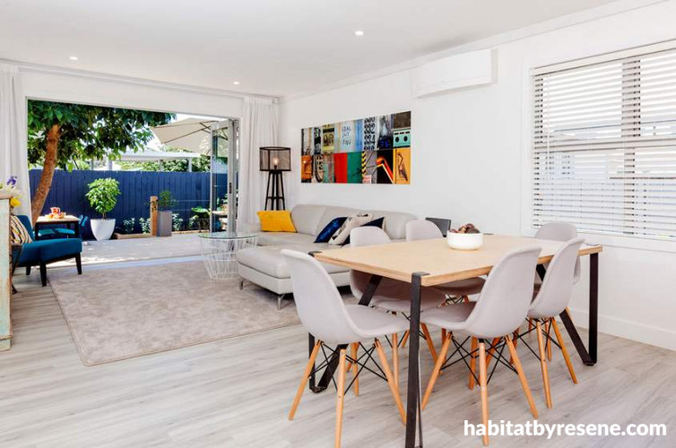 white dining room, white lounge, living room, deck, indoor-outdoor flow, 