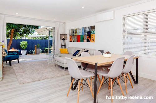 white dining room, white lounge, living room, deck, indoor-outdoor flow,