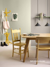 dining room, green dining room, yellow coat rack, entranceway, wood dining
