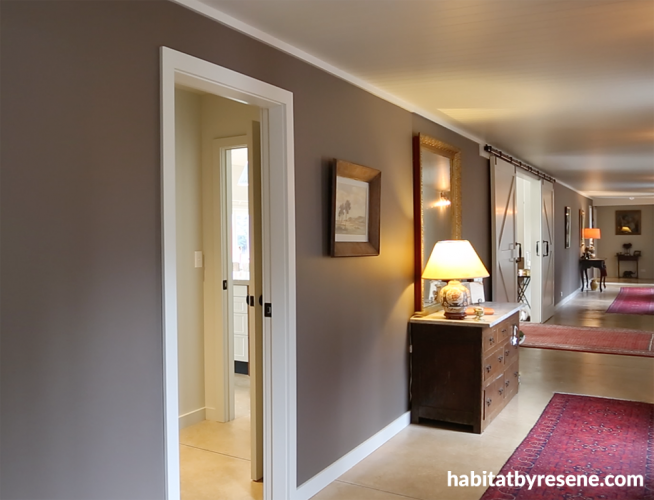 hallway, brown hallway, neutrals, barn style doors, grand, brown paint, brown entranceway
