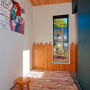 hallway, holiday cabin, dark blue feature wall, timber ceiling, play area