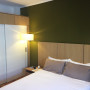 bedroom, green bedroom, green feature wall, timber bedhead, custom bedhead, contemporary bedroom 