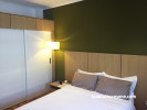 bedroom, green bedroom, green feature wall, timber bedhead, custom bedhead, contemporary bedroom 