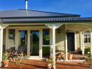 exterior, green, villa, front door, decorative trim
