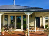 exterior, green, villa, front door, decorative trim