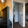 entranceway, stairwell, black and white, black entranceway, batten walls, resene double cod grey