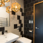 black and white bathroom, black paint, black door, bathroom inspiration