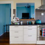 kitchen, yellow kitchen, blue lounge, yellow and blue, pastel yellow