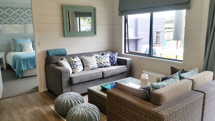 holiday house, feature wall, blue, living room, bach, beach house, stripe, stripes, painted timber