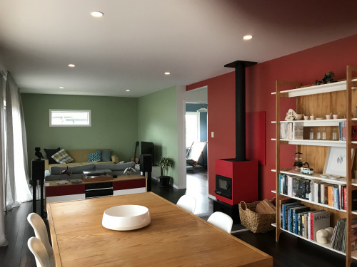 red dining room, open plan living, green living room, bookshelf inspiration, Resene