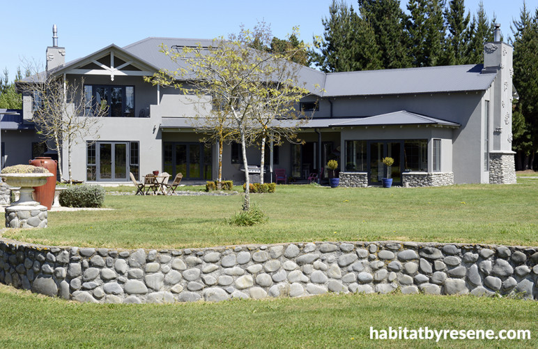 house exterior, grey house, grey exterior, lifestyle block, garden, stonewall