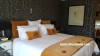 wallpaper, luxury, bedroom trends, master bedroom, charcoal interiors, pattern