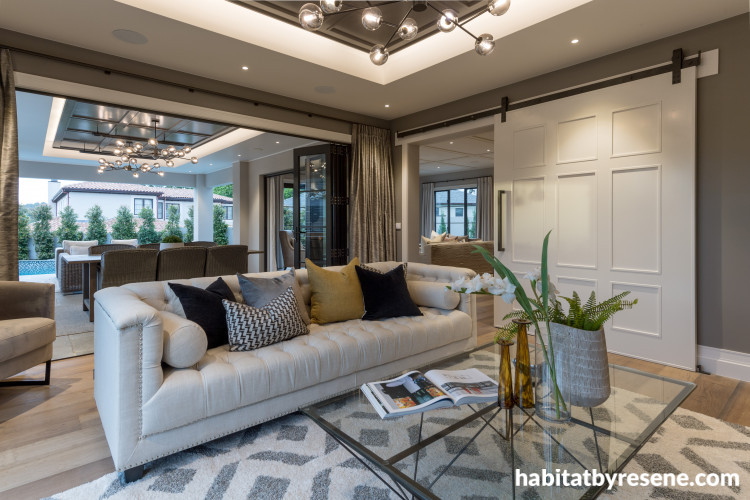 home cinema, tv room, lounge, living room, grey lounge, neutral lounge, barn door, grey interior