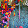 paisley stencil, blue fence, resene hullabaloo, knitted tree, painted fence