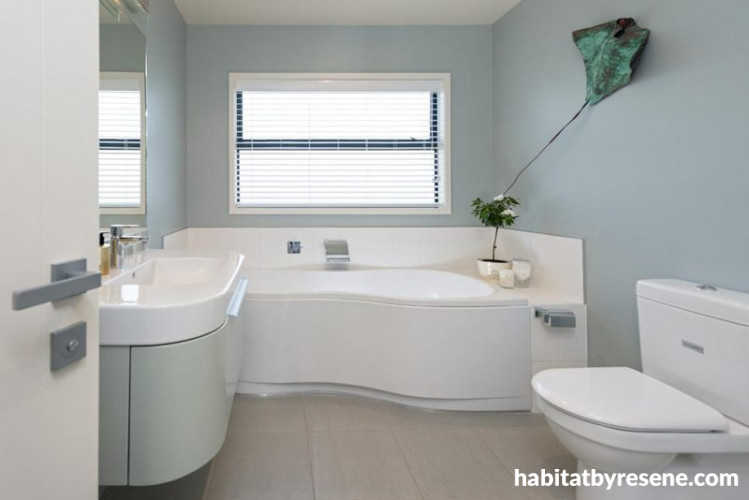 blue bathroom, beach house, white cabinetry, interior