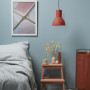 bedroom, blue bedroom, blue and orange, orange accessories, blue feature wall
