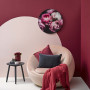 living room, red feature wall, painted circle, pink chair, pink and red, painted feature wall