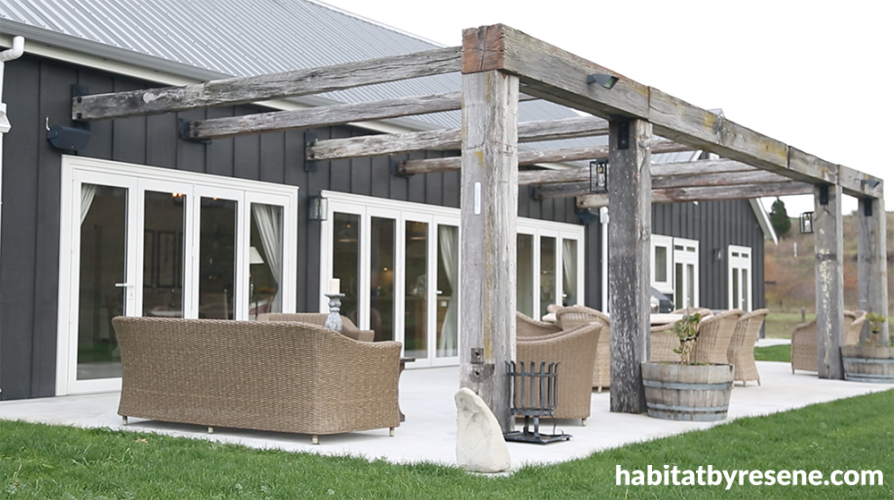 house exterior, barn style house, black house, black exterior, outdoor living area